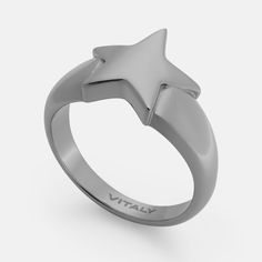 a silver ring with a star on the middle and an inscription that says, stay