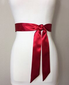 "Narrow Crimson Sash Crimson Red Satin Sash Dark Red Bridesmaid Sash Deep Red Wedding Dress Sash Crimson Satin Sash Belt Satin Swank Now in a narrow version, this Satin Swank® waist sash is the perfect finishing touch for your wedding, bridesmaid, or special occasion dress, or just the right piece to add instant polish to your dress or top. Depending on your waist size and the length you choose, you can wrap the sash around your waist once or up to three times. You decide whether to tie the sash Satin Ribbon Bridal Belt For Parties, Elegant Red Wedding Sash, Bridesmaid Sash With Satin Bow, Satin Sash With Bow For Bridesmaids, Bridesmaid Satin Sash With Satin Bow, Bridesmaid Satin Sash With Bow, Satin Bridal Belt For Bridesmaids, Satin Bridal Belt For Party, Satin Sashes For Bridesmaids