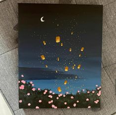 a painting of hot air balloons flying in the night sky with pink flowers on the ground