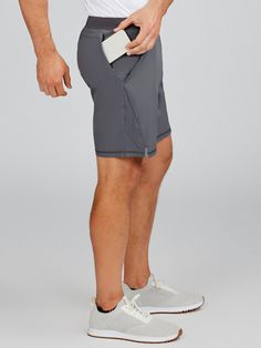 The Velocity 8in Unlined Shorts are designed for comfort and functionality. They are lightweight, providing ease of movement, and are water-resistant, making them suitable for various activities. Additionally, these shorts feature pockets for convenient storage of small items while on the go. Style #TM760. Nylon Training Bottoms With Functional Pockets, Functional Nylon Bottoms With Short Inseam, 5-inch Inseam Athletic Shorts With Pockets For Workout, Nylon Athletic Shorts With Functional Pockets, Gray Nylon Athletic Shorts With Built-in Shorts, Nylon Athletic Shorts With Side Pockets, Nylon Gym Shorts With Functional Pockets, Nylon Workout Shorts With Side Pockets, Workout Athletic Shorts With Pockets, 5-inch Inseam