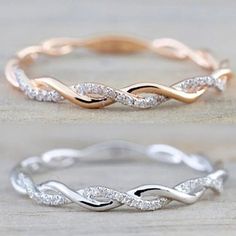 two different types of wedding bands with diamonds on them, one in gold and the other in silver