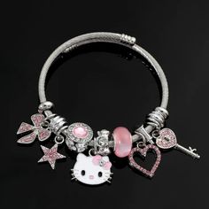 Adorable Hello Kitty Charm Bracelet! Comes Complete With 7 Charms Plus Spacers. Hypoallergenic. Great Gift For Hello Kitty Fans Young Or Not So Young. Comes In A Gift Box With A Pretty Organza Ribbon. Bundle & Save. Proceeds Will Help Cats & Kittens In Need. Casual Silver Metal Charm Bracelet, Hello Kitty Charm Bracelet, Cute Metal Charm Bracelet, Casual Silver Charm Bracelet As Gift, Cute Adjustable Metal Charm Bracelet, Cute Nickel-free Stainless Steel Jewelry, Cute Silver Hypoallergenic Bracelets, Cute Hypoallergenic Silver Bracelets, Adjustable Metal Charm Bracelet, Cute Style