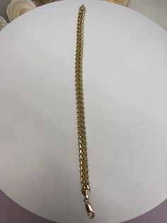 Genuine high quality and workmanship 14k Solid yellow gold Miami Cuban link mens bracelet. This hand made heavy bracelet is approximately 39 grams. The width on this bracelet is 8mm. The length is 9 inches long. Comes in a nice box. Fast shipping available upon request. Can be made at lower or higher cost depending on the weight of the gold, message me for details. Authentic gold bracelet. Formal Cuban Link Gold Bracelet, Formal Polished Gold Cuban Link Bracelet, Formal Gold Cuban Link Bracelet, Stackable Diamond Bands, Pear Shaped Diamond Ring, Authentic Gold, Miami Cuban Link, Miami Cuban, Morganite Ring