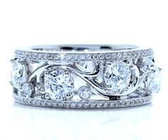 a white gold wedding band with round diamonds