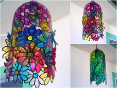 three pictures of different colored glass flowers hanging from a light fixture in a room with white walls