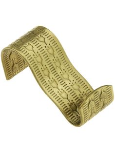 a gold bracelet with fish scales on it's sides and an intricately designed clasp