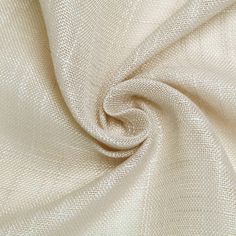 a close up view of a white fabric