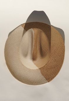 We teamed up with woman ran UNSECO protected artisans in Ecuador, the original origin of the Panama hat. Together we created a two toned western cowboy hat, with the classic panama technique. Handcrafted out of 100% natural toquilla straw. Natural coloring on the left side, toasted toquilla on the right. A cattleman crown measuring 12cm & brim at 9cm. This hat celebrates & honors indigenous women who weave the Panama hat. An art & craft that has been passed down among generation. Adjustable- Vel Western Six-panel Hat For Rodeo, Western Six-panel Rodeo Hat, Artisan Beige Fedora With Curved Brim, Beige Panama Hat With Curved Brim For Rodeo, Beige Curved Brim Panama Hat For Rodeo, Brimmed Beige Panama Hat For Ranch, Artisan Fedora Panama Hat For Rodeo, Western Beige Fedora Made Of Toquilla Straw, Western Style Beige Fedora In Toquilla Straw