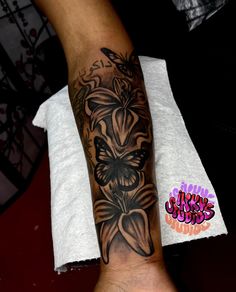 Tattoo Ideas Female Flowers On Arm, Flower And Butterfly Tattoo Sleeve For Women, Simple Quarter Sleeve Tattoos For Women, Medium Tattoos For Women Arm, Lion Tattoo Black Women, Meaningful Arm Tattoos Men, Feminine Half Sleeve Tattoo Forearm, Tattoos For Black Skin Women, Women Forearm Tattoo Ideas