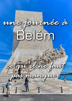 two people standing in front of a monument with the words, une jounine d'belem