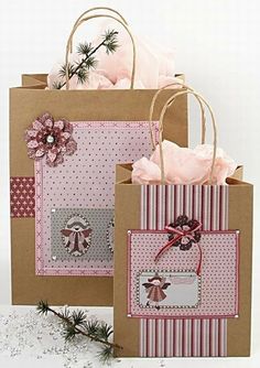 two brown bags with pink and white designs on them