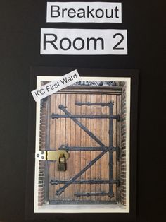 there is a sign that says breakout room 2 and the door has a lock on it