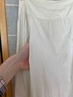 "Late 1800's white cotton skirt with crocheted hem. Has many many stains, on the hem and body of the skirt. Being sold as is Waist: 25.5\" Waist to hem: 38\"" Cotton Petticoat With Gathered Skirt For Daywear, Vintage Petticoat For Summer Daywear, Cotton Skirt With Lace Trim For Daywear, Vintage Cotton Dresses With Lined Skirt, Daywear Cotton Petticoat With Lace Trim, Cotton Lace-trimmed Petticoat For Daywear, Cotton Petticoat With Lace Trim For Daywear, Vintage Cotton Petticoat For Daywear, White Lined Cotton Petticoat