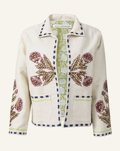 The Big Bloom Embroidered Jacket is a beige cotton linen piece that features an open front adorned with intricate red and green floral hand embroidery. Its collar and edges display a blue checkered pattern, complemented by an inner lining featuring a green and white floral print. Linen Jackets Women, Alix Of Bohemia, Jacket For Spring, Embroidery Jacket, Celine Daoust, Structured Jacket, Ecru Color, Olympia Le Tan, Linen Jackets