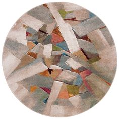 a round rug with multicolored shapes on it