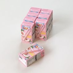 several pink boxes stacked on top of each other