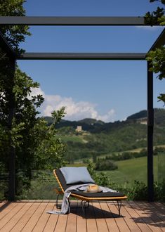 a chair sitting on top of a wooden deck