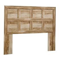 the headboard is made from wood and has square panels on each side, as well as an open panel