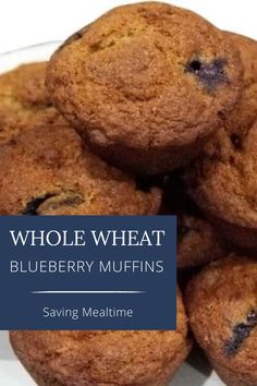 a pile of blueberry muffins sitting on top of a white plate with the words, whole wheat blueberry muffins saving mealtime