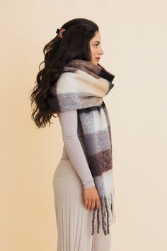 Wrap yourself in effortless coziness with the Cozy Breeze Oversized Fringe Scarf! A fall and winter must-have, this scarf features a timeless plaid pattern in soft, dreamy hues that bring both warmth and style to chilly days. Its oversized fit delivers all the snug feels, while the playful fringe adds just the right touch of flair. Whether you're sipping a pumpkin spice latte or strolling through a winter wonderland, this classic plaid scarf will keep you chic and cozy all season long! #lovemyle Fall Winter Essentials, Winter Must Haves, Kimono Sweater, Cozy Scarf, Fall Scarves, Fringe Scarf, Bralette Tops, Winter Essentials, Kimono Dress