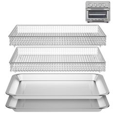 three metal trays stacked on top of each other next to a toaster oven