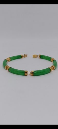 14K Yellow Gold Green Jade Curved Link Bracelet. Six Green Jade link section Curved Jade Bracelet in 14k yellow gold for her and for him. Bracelet Info: - Gemstone: Green jade, - Bracelet length: 7 Inches / Bracelet width: 5 Millimeters - Materials: Yellow Gold - Finished: 14k - Nice gift box Included. Classic Jade Bracelets For Formal Occasions, Green Jubilee Gold Bracelet For Formal Occasions, Formal Green Gold Jubilee Bracelet, Green Bangle Bracelet For Formal Occasions, Green Bangle Bracelets For Formal Occasions, Classic Green Bangle Jewelry, Formal Yellow Gold Jade Bracelets, Formal Green Bangle Bracelets, Formal Yellow Gold Jade Bracelet