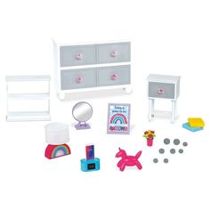 a dollhouse bedroom with furniture and accessories on the floor, including a dresser, mirror, toy horse, toys