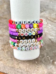 Celebrate unity with our Custom Friendship Bracelets! Available in bulk quantities of 1, 25, 100, or 1000, these personalized name bracelets are perfect for team events, gatherings, or as thoughtful bulk gifts. Each beaded bracelet can be customized with a name or meaningful word (up to 12 characters), making them unique keepsakes for friends and teammates. Crafted with quality materials, our custom bead bracelets combine style and durability. Enjoy fast shipping and exceptional craftsmanship wi Bead Name Bracelets, Bulk Gifts, Team Bracelets, Name Bracelets, Team Events, Jewelry Care Instructions, Halloween Event, Bracelet Beaded, Name Bracelet