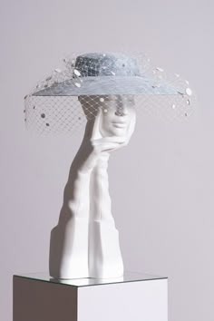 A classic Boater style hat made in Sinamay, trimmed with soft veiling and embellished with polka dots. One size, it is secured with a hat elastic which sits under the hair. This style is made to order with a 4-8 week lead-time Spring Millinery, Wedding Millinery, Veil Designs, Suzannah London, Madeleine Vionnet, Embroidered Shirt Dress, Veiled Hats, London Boutique, Bridal Attire