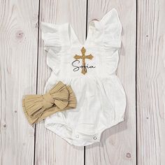 Looking for that cute Christening or Baptism outfit for your little one?  This is an adorable white linen romper with a vinyl gold glitter cross on the front and personalization is optional.  The bow is sold separately at check out The Romper has two buttons for an adjustable length and can grow with your cute baby! Cream Bubble Romper For Summer Baptism, White Bubble Romper For Baptism In Summer, White Bubble Romper For Baptism, White Fitted Bubble Romper For Baptism, White Bubble Romper For Baptism And Spring, White Bubble Romper For Baptism In Spring, Cute Cotton Baptism Dress, Christening Outfit Girl, Baby Christening Outfit