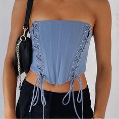 Blue Corset Top. Trendy Bandage Corset For Spring, Elegant Fitted Blue Tube Top, Chic Summer Overbust Corset Belt, Chic Overbust Corset Belt For Summer, Elegant Blue Sleeveless Tube Top, Elegant Blue Tube Top For Summer, Elegant Blue Corset With Corset Back, Spring Bandage Bandeau Corset, Summer Bandage Bandeau Corset