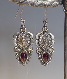 A fine vintage pair silver boho design long drop earrings. decorative silver raised pendant earrings set with a cabachon pear shaped cut real garnet. mounted with silver  shepherd hook fittings. drop length 6cm x 2.2cm wide.stamped 925 on backs. Pendant Earrings Set, Set Earrings, Baroque Pearl Necklace, Jade Earrings, Long Drop Earrings, Boho Design, Jade Carving, Boho Designs, Baroque Pearls