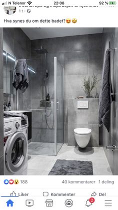 a washer and dryer in a bathroom with grey tiles on the walls, along with a toilet