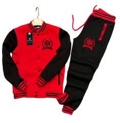 Stay comfortable and stylish with the Home Grown Hustler varsity set. This set includes a varsity jacket and matching jogger pants, both made from a soft and stretchy fabric. The relaxed fit allows for maximum mobility, while the bold logo adds a touch of flair. Whether you're running errands, meeting up with friends, or just lounging at home, this varsity set is a perfect choice. Plus, it's easy to care for – just toss it in the wash and it's good as new. Available in sizes S-XXXL, this varsity Cheap Varsity Tops With Direct To Garment Printing, Casual Cotton Activewear With Three Stripes Branding, Sporty Cotton Varsity Jacket For Streetwear, Casual Cotton Varsity Jacket, Sporty Fleece Tracksuit For Loungewear, Fleece Athleisure Tracksuit For Leisure, Casual Red Sports Sweats, Red Casual Sports Sweats, Red Sporty Sweatpants For Leisure