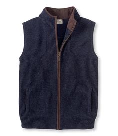 Inspired by the first waterfowl sweater we offered in the 1930s, the naturally water-repellent merino wool Waterfowl Sweater Vest is a practical midlayer that duck hunters rely upon in raw wet conditions. Traditional Fit: Relaxed through the chest, sleeve and waist. 100% merino wool body. Handwash, dry flat. Shoulder shooting patches integrated into the knit for durability. Fleece-lined handwarmer pockets. Soft microsuede collar lining. Easy-to-grasp leather zipper pull. Imported. Outdoor Fall Vest With Fleece Lining, Fall Outdoor Merino Wool Outerwear, Navy Cotton Sweater Vest For Winter, Rugged Winter Vest For Outdoor Activities, Rugged Outdoor Winter Vest, Classic Navy Winter Vest, Classic Winter Outdoor Sweater, Classic Outdoor Vest For Fall, Casual Wool Sweater For Outdoor