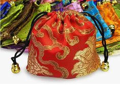 Really pretty silk brocade drawstring pouch for you to keep that precious rosary or piece of jewellery in The pouch is lined and measures 110mm x 110mm Vibrant colours  PLEASE MAKE SURE YOUR SHIPPING ADDRESS IS CORRECT  If you are purchasing the listing as a gift I can send direct to the recipient for you if you enter the address in "the note to seller" box before checkout Only one address per transaction  I ship to the shipping address listed on your Etsy account. I am not responsible for order Red Potli Bag For Festivals And Gifts, Gold Embroidered Pouch For Gift, Traditional Rectangular Coin Purse For Gift, Traditional Rectangular Coin Purse As Gift, Traditional Rectangular Coin Purse Gift, Red Coin Purse Pouch For Gift, Red Pouch Coin Purse As Gift, Red Pouch Coin Purse For Gift, Festival Potli Pouch Bag Gift