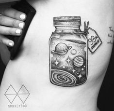 a woman's stomach with a jar on it