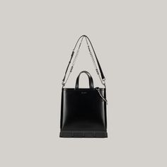 Black Double Handle Bucket Bag With Adjustable Handle, Black Double Handle Adjustable Bucket Bag, Black Bucket Bag With Adjustable Double Handle, Minimalist Black Satchel With Detachable Handle, Minimalist Black Bucket Bag With Detachable Strap, Modern Black Box Bag With Handles, Black Box Bag With Handle Drop For Everyday Use, Black Box Bag With Handles For Everyday, Everyday Black Box Bag With Handles