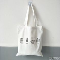 Cactus Canvas Tote Bag at Sage and Sill Casual Reusable Tote Bag, White Large Capacity Canvas Bag, Practical White Canvas Bag With Large Capacity, Practical White Bag For Daily Use, Practical Large Capacity White Canvas Bag, Casual Reusable Canvas Bag, Practical White Tote Bag, White Reusable Travel Bags, Casual Reusable Canvas Shopping Bag