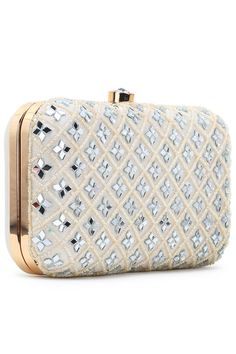 A must have Geometric Mirror Work Clutch from Anekaant's Adorn collection that will go great with your outfits. This Off White Faux Silk Clutch adds glamour to your evening look and makes you stand-out in the crowd. The sturdy Clutch and Detachable Metal Chain will make sure you are never worried of it breaking apart. Secured with a Click closure & you will find this Clutch quite spacious to hold a phone & makeup & keys and a small pouch. ProductFeatures: Color: Off White Material: Faux Silk Wor Luxury White Clutch For Shopping, Luxury White Rectangular Case Clutch, Luxury White Pouch Clutch, Luxury Festive Clutch With Mirror Work, Luxury White Clutch With Removable Pouch, Luxury Formal Clutch With Zari Work, Cheap White Clutch Wristlet, Reception Sarees, Formal Saree