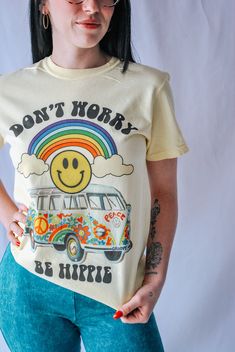 Don't Worry, Be Hippie Color Comfort Tee Hippie Soft-washed Cotton T-shirt, Spring Acid Wash Tops, Hand Dyed Graphic Tee For Spring, Spring Graphic Tee Hand Dyed, Acid Wash Crew Neck T-shirt With Hippie Style, Yellow Hippie Cotton Top, Hippie Crew Neck Soft-washed Top, Hippie Soft-washed Crew Neck Top, Vintage Bleached Tops For Spring