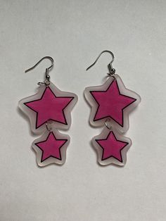 This is a pair of pink Star dangle earrings. I love how these turned out! I love the color and how these stack and dangle. Such a fun design! Star Dangle Earrings, Pink Star, Pink Stars, Fun Design, Star Earrings, Jewelry Earrings Dangle, Etsy Earrings, Dangle Drop Earrings, Cool Designs