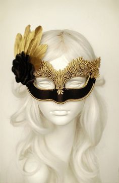 Venetian style black and gold masquerade ball mask covered with black satin. Embellished with gold lace, braided trim, black beads, black satin rose and gold feathers. Your order will be delivered with online tracking by DHL or UPS. Back surface is also covered with fabric for comfortable Black Full Face Carnival Masks, Black Full Face Masquerade Accessories, Black Full Face Masquerade Costume Accessories, Black Full Face Masks For Carnival, Gold Gothic Masquerade Mask For Carnival, Gothic Gold Masquerade Mask For Carnival, Full Face Black Masquerade Mask For Costume Party, Full Face Masquerade Mask For Halloween Party, Full Face Halloween Masquerade Mask For Party