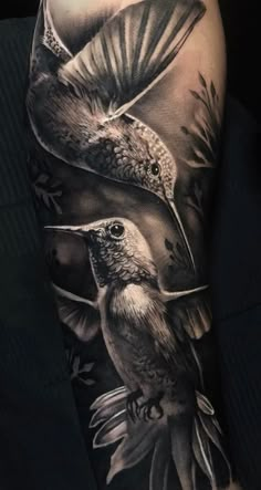 Hummingbird Tattoos That Are Not Only Artistic But Meaningful Hummingbird Tattoo Black, Hummingbird Tattoo Meaning, Hummingbird Flower Tattoos, Bird Tattoo Sleeves, Hummingbird Tattoos, Small Hummingbird Tattoo, Black And White Tattoo, Realistic Tattoo Sleeve, Prison Tattoos