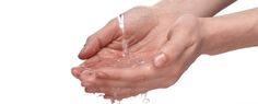 a person holding their hands under running water from a faucet in the air