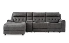 a gray couch with two recliners and a footstool