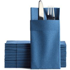 a stack of blue napkins with forks and knives in them