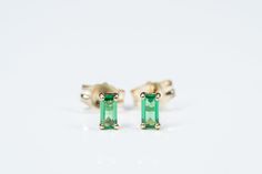 Introducing our new MICRO (tiny) Collection: Our new gorgeous, timeless gemstone emerald earrings features micro (tiny) dainty emeralds set in your choice of gold plated, gold filled, gold over sterling silver 925 or solid gold 14 karat. Sold individually or in a pair, it is your choice. *You will only receive solid gold if you choose solid gold at check out. ✦ DETAILS ✦ ✧ Handcrafted ✧ 4mm x 1.7mm Emerald Gemstone ✧ Choice of Gold Plated, Gold Filled, Gold Over Sterling Silver 925, 14K Solid Go Gold Emerald Earrings, Emerald Stud Earrings, Rose Gold Butterfly, Emerald Green Earrings, Small Stud Earrings, White Gold Earrings Studs, Emerald Earrings Studs, Tiny Stud Earrings, Small Earrings Studs