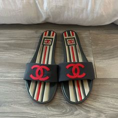 In Great Condition. Super Comfortable And A Rare Find Designer Beach Slides With Cushioned Footbed, Designer Slides With Branded Insole For Beach, Designer Beach Slides With Branded Insole, Designer Multicolor Beach Sandals, Designer Slip-on Sandals With Red Sole, Designer Multicolor Flat Sandals, Designer Flat Slides For Beach, Designer Multicolor Sandals For Vacation, Designer Flat Flip Flops For Beach