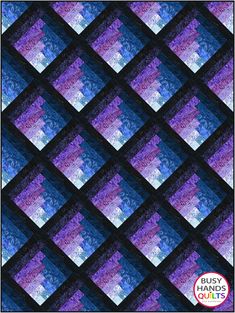 a blue and purple checkered quilt with the words, busy quilts on it